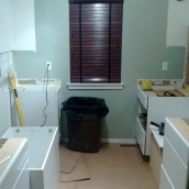 Day 1: kitchen gutted and lower cabinets placed - sparrowsoirees